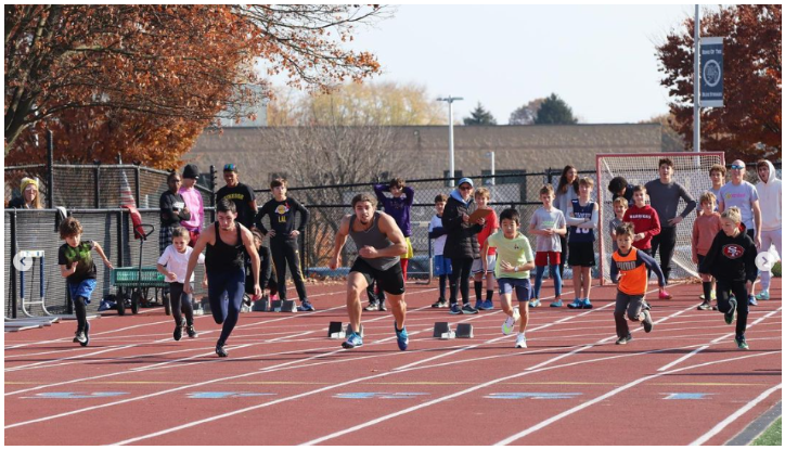 races running on Manheim Township High School track