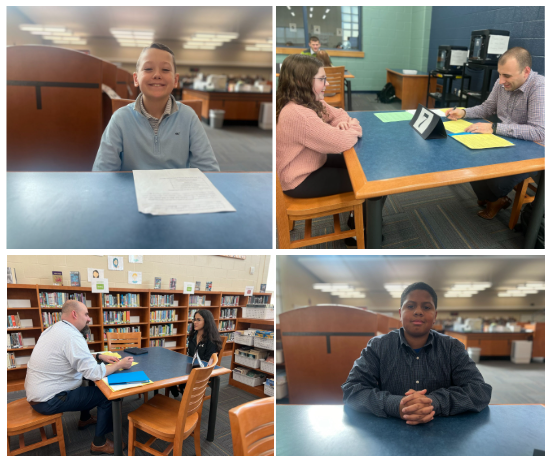 students interviewing at tables with adults for their Biztown Initiative 